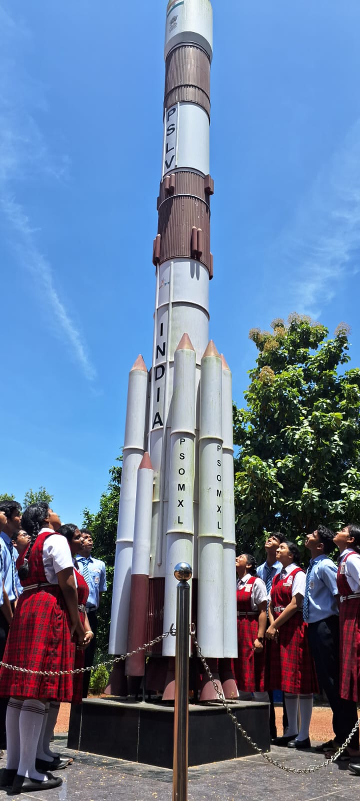 Students explore a PSLV rocket display — engineering and space education